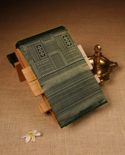 Green Colour Wedding silk saree Featuring Gold Zari Box Pattern on Body, Finished with Self colour With Traditional border, Comes with Matching Blouse Piece.
