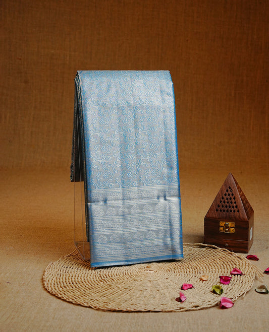 Blue & Gold colour Double shade Semi tissue silk saree featuring self color kodi pattern on body, self colour with traditional border, paired with matching.
