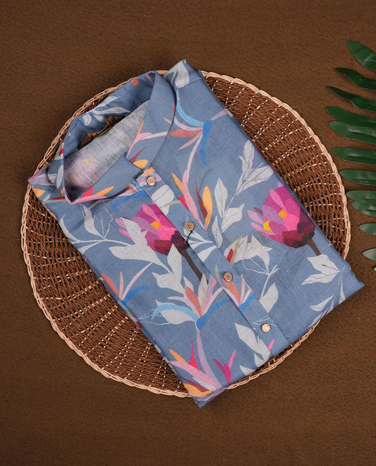 Steel blue men's kurta adorned with vibrant pink and orange floral prints, featuring a Mandarin collar, half-button placket, and full sleeves for a bold, contemporary festive look.