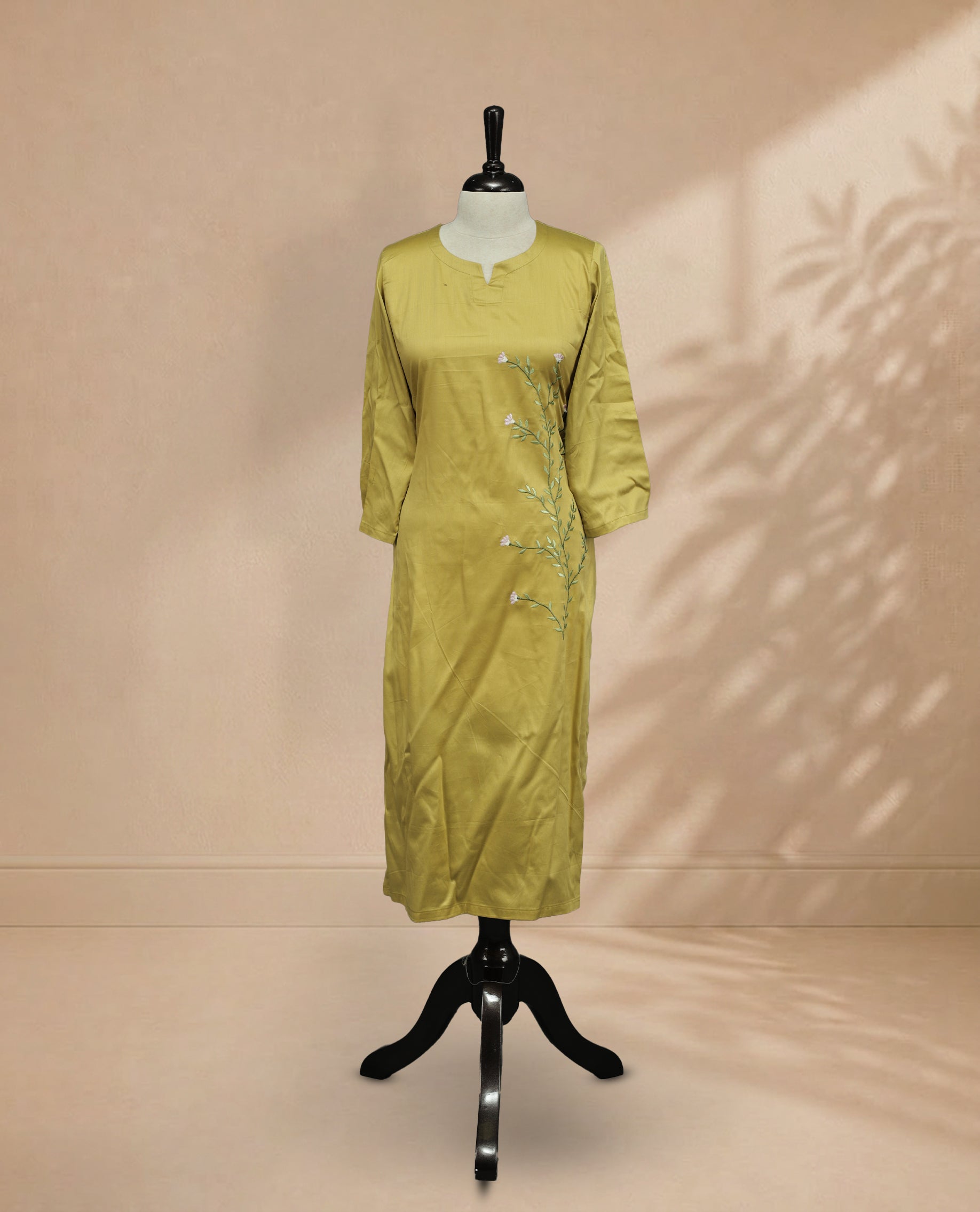 Pastel Green Colour Kurti Featuring U-Shaped Neckline, delicate  floral vine embroidery Work On Body & Sleeve