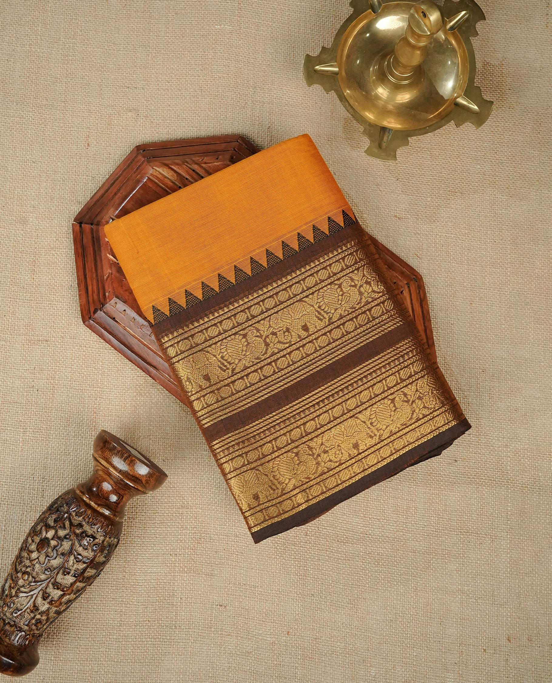 Mustrad colour chettinad cotton saree featuring Elegant plain body,Contrast Brown colour with Gold zari border, comes with matching blouse piece.