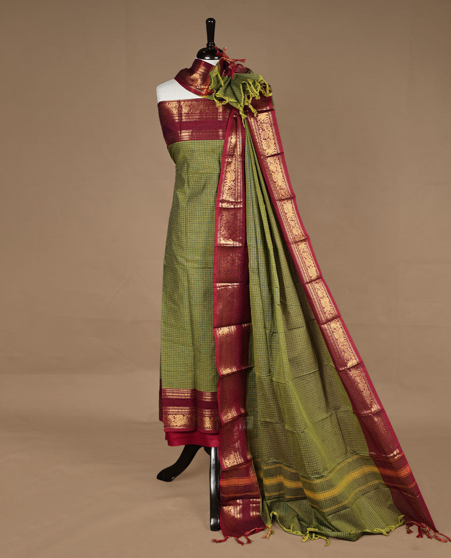 Mehandi colour chettinad salwar set featuring check pattern on body,contrast red colour with gold zari border, paired with matching bottom and dupatta.