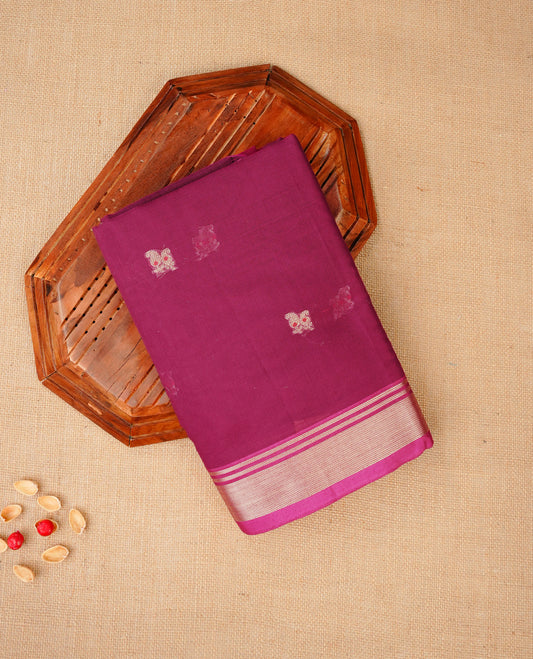 Dark magenta colour Maheshwari cotton saree, gold zari floral motifs on body, complement self colour gold zari border comes with matching blouse.