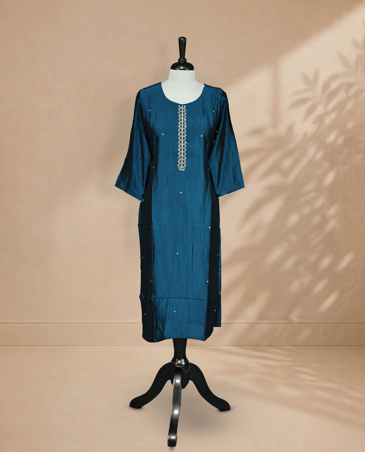 Peacock  Colour Kurti featuring beadwork across the body, a U-shaped neckline adorned with bead and Stone work and a 3/4 Sleeve With A Matching design.