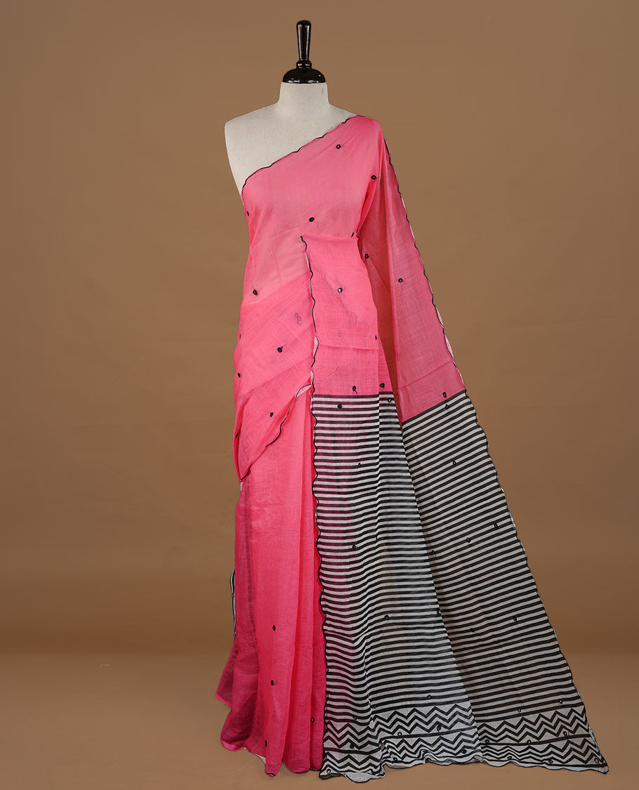 Pink colour Semi Linen saree featuring mirror work with intricate thread detailing, enhanced by a stylish scallop border. Comes without a blouse piece.