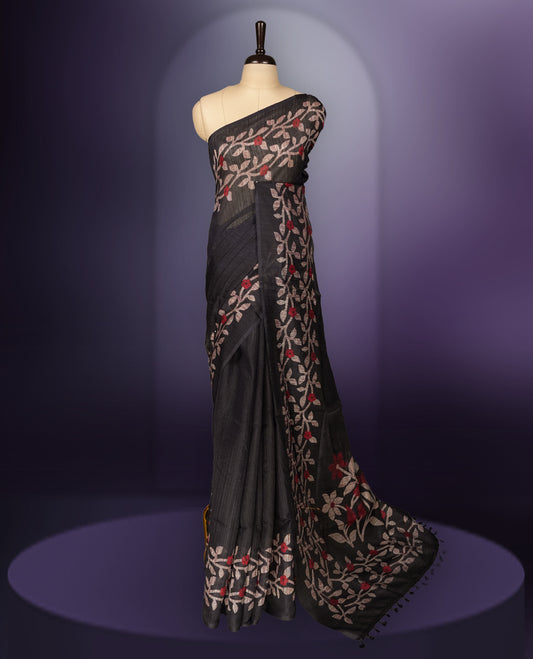 Navy blue colour saree with elegant beige & red colour leaf & flower work and subtle texture & Paired with a matching blouse, its perfect for festive events, receptions, or traditional gatherings with a touch of grace.