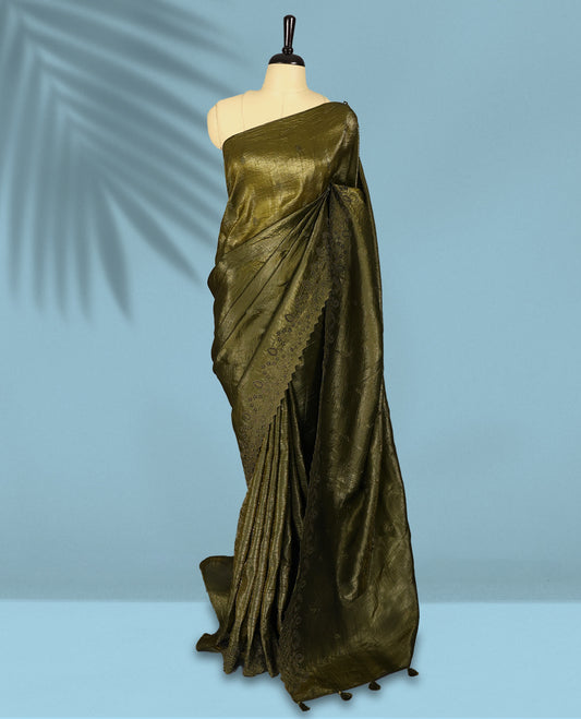 Olive Colour crush soft silk saree, textured body with a natural crinkled finish, adorned with intricate self colored floral Motifs and complemented by a delicate thread embroidery cutwork border, paired with a matching blouse