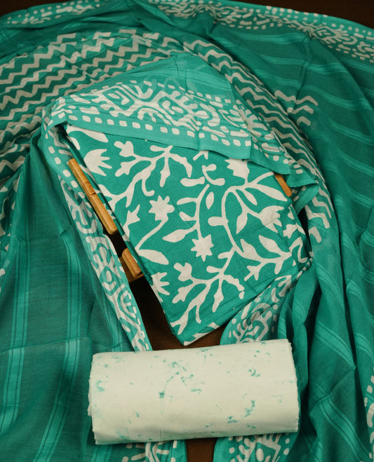 Persian Green colour churidar material featuring white floral printed body, paired with a matching chevron printed dupatta.