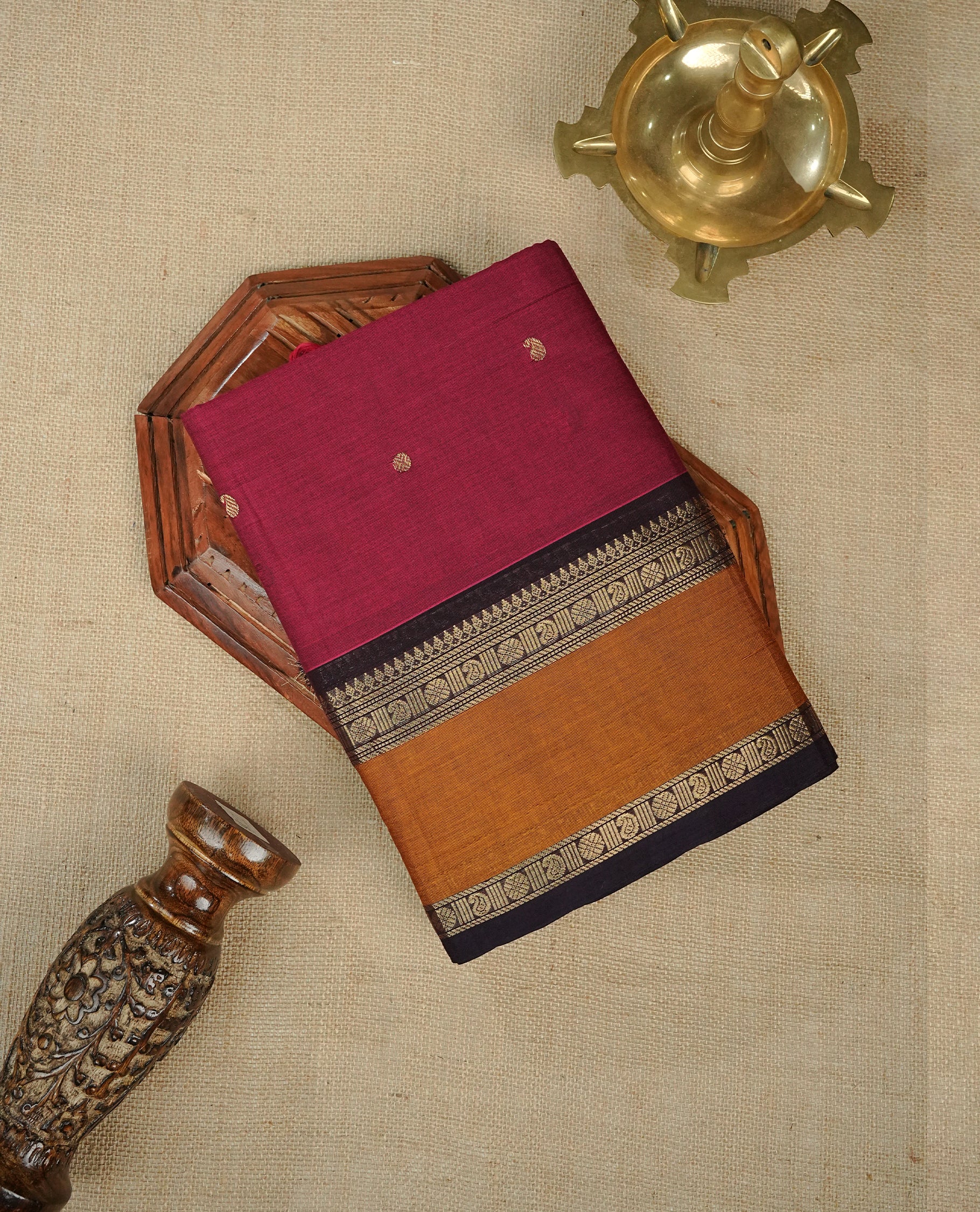 Magenta Colour Chettinad Cotton Saree Featuring Gold Zari Mango Motifs on the Body, Complemented by a Contrast Dark Wine & Mustard Yellow Colour Border with Gold Zari Design and a Contrast Grand Gold Zari Pallu, Paired with a Matching Blouse Piece.