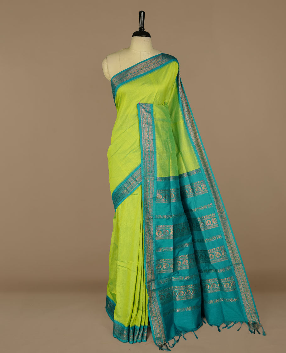 Lemon colour kalyani cotton saree featuring Elegant plain body, complemented by Aqua colour with Antique zari border, paired with matching blouse piece.