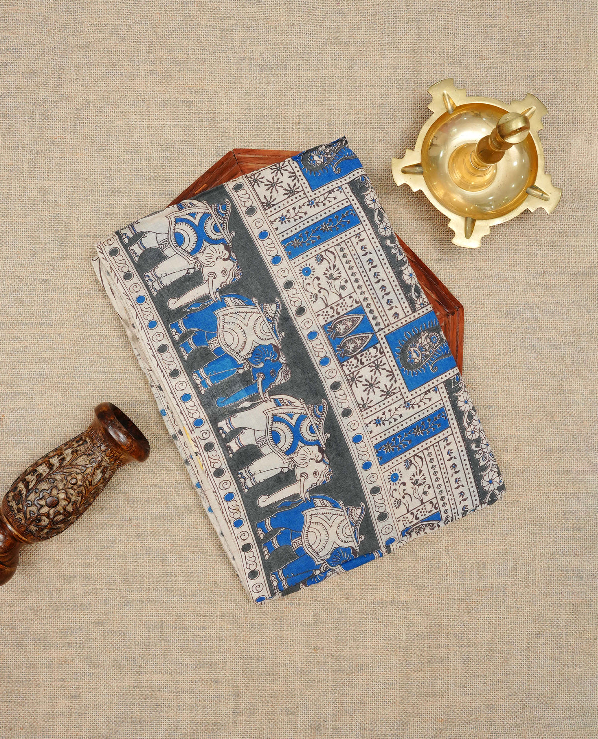 Cream & blue colour kalamkari cotton saree featuring kalamkari printed body & pallu, paired with a matching  contrast blouse piece.