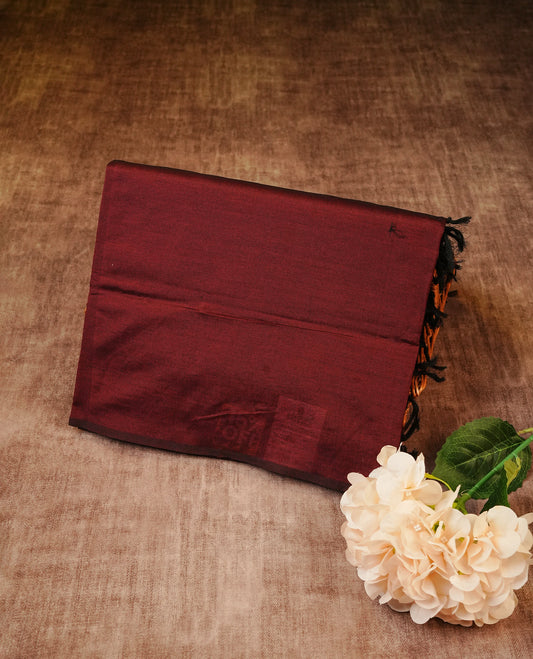 Maroon colour Polycotton Saree featuring elegant Leaf ajrakh designs on the body, complemented by a matching pallu & Paired with a contrasting printed blouse piece