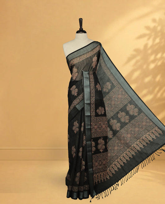 Black Colour Semi Linen saree featuring digital printed body, Complemented by Borderless finish, comes with matching blouse piece.