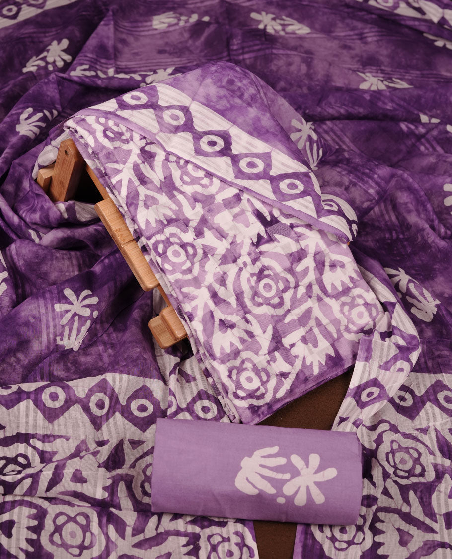 Purple colour churidar material featuring white floral printed body, paired with a matching chevron printed dupatta.