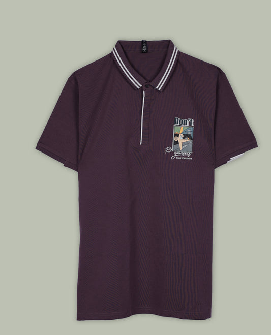 Concord grape colour T shirt featuring a graphic print on left side , classic shirt colour and short sleeves, for a casual, stylish look.