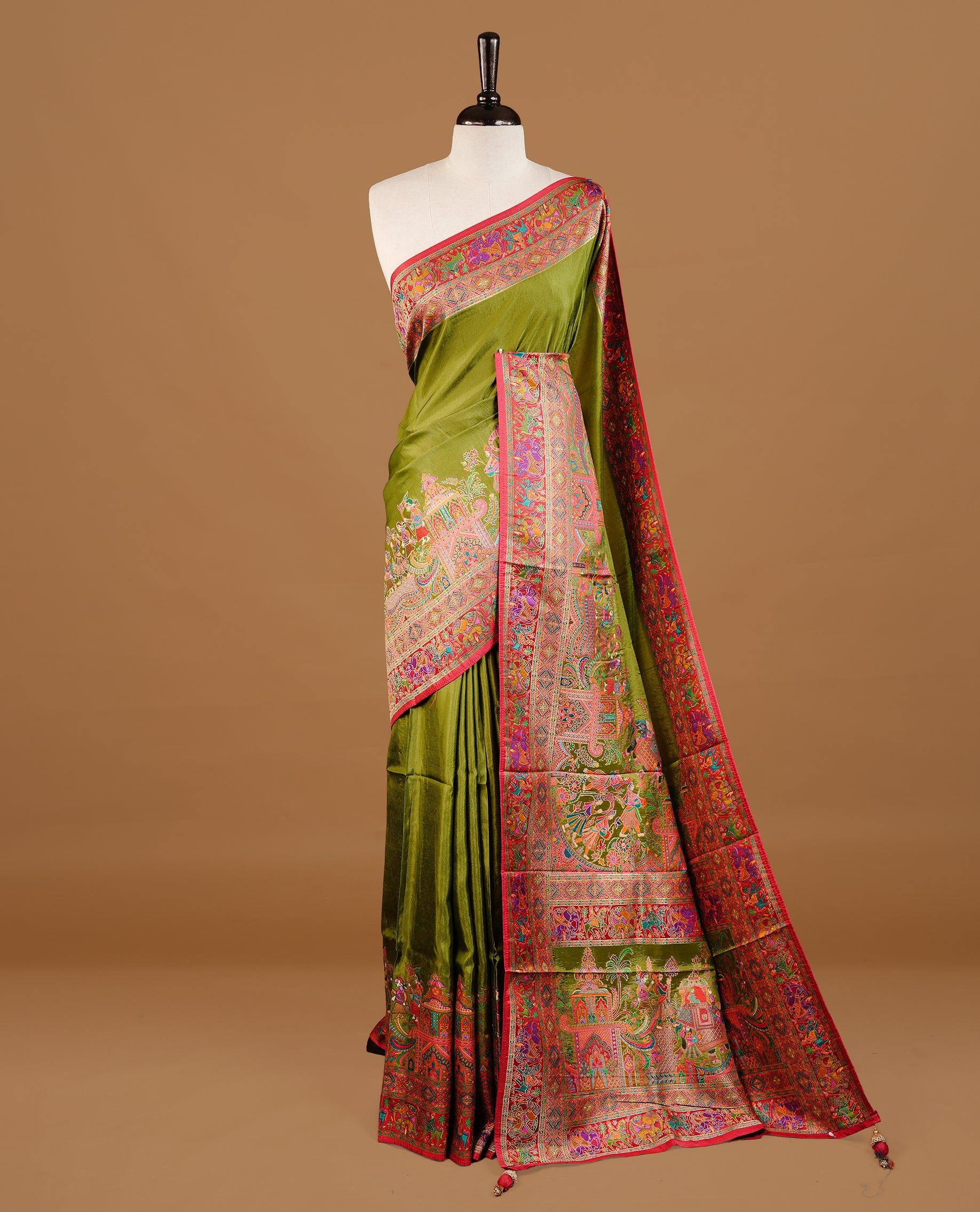 Olive green colour Pashmina Saree featuring Plain body, a contrast multicolour Temple & Paisley woven motifs border with red edging, an ornate paisley woven pallu, paired with a matching blouse.