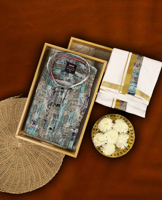 Multicolour abstract patterned MCR full sleeve shirt in shades of teal, grey, and navy, paired with a classic white dhoti featuring a rich golden zari kara and a matching multicolour printed border.