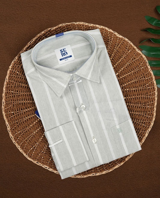 Light green colour full sleeve shirt featuring vertical white stripes for a clean, slimming look & Styled with a classic collar, button down front, and chest pocket.