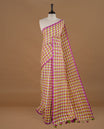 Green, Purple and White colour Mul Cotton saree featuring a classic Big check pattern on the body, accented with tassels for added charm. Comes without a blouse piece.