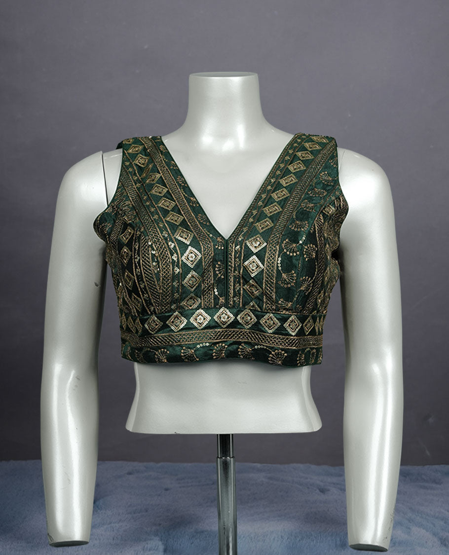 Dark Green colour embroidered sleeveless blouse with intricate geometric motifs, deep V neckline, and tie-up back detailing for a chic finish.