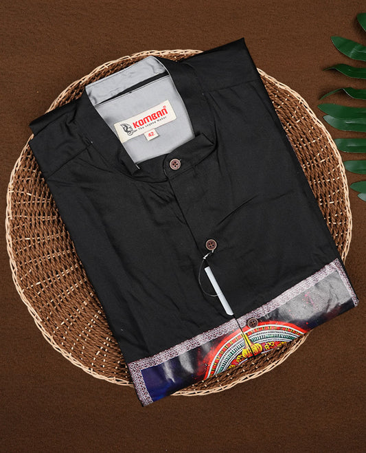 Stylish black cotton shirt featuring a vibrant Kathakali themed digital print on the front panel, designed with a mandarin collar and button down closure, perfect for cultural events and festive occasions.