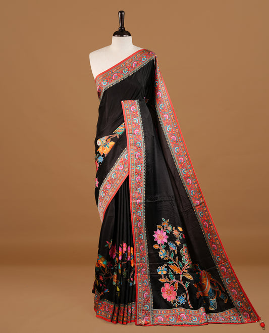 Black colour Pashmina Saree featuring a plain body, a multicolour floral woven border, a floral woven pallu, paired with a matching blouse.
