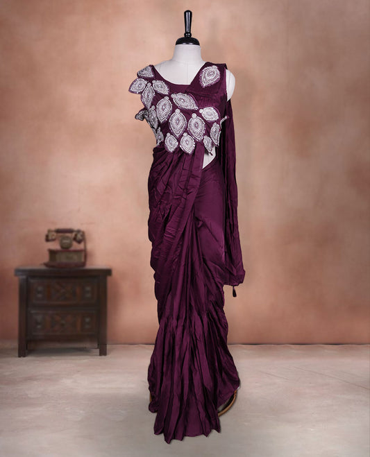 Deep maroon colour ready to wear saree featuring bold silver applique embroidery on the drape, paired with a sculpted matching blouse