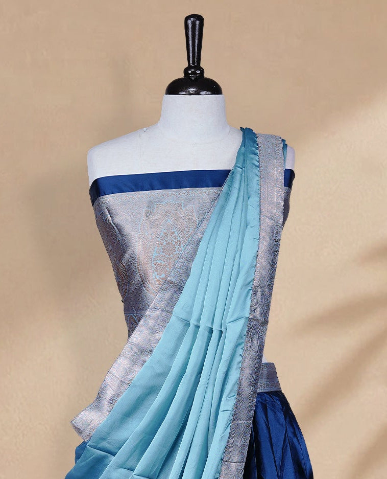 Teal Blue colour Half saree featuring Plain skirt with Zari border on contrast Aqua colour border, Unstitched Blouse and matching dupatta.