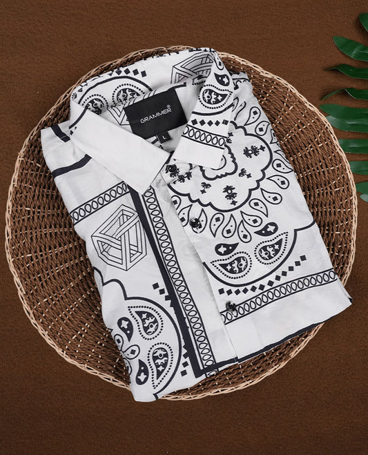 White colour shirt adorned with elegant black colour floral prints, Designed with a classic collar and short sleeves, this timeless piece offers a crisp and casual look, perfect for both work and weekend wear.