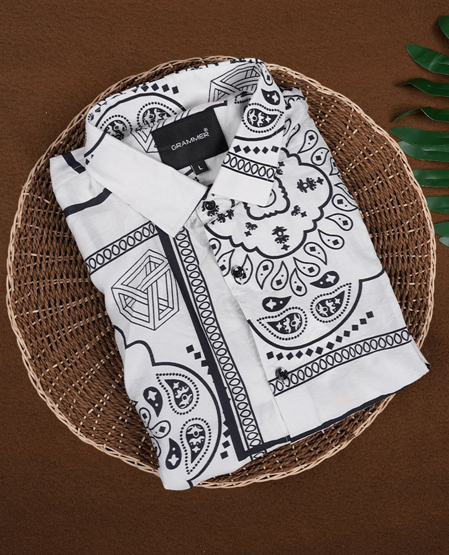 White colour shirt adorned with elegant black colour floral prints, Designed with a classic collar and short sleeves, this timeless piece offers a crisp and casual look, perfect for both work and weekend wear.