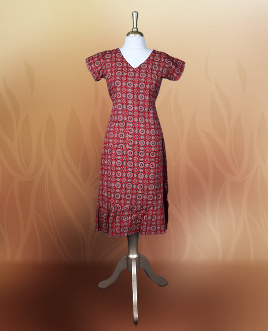 Red colour nightwear with intricate circular patterns in beige and black, Designed with a V neckline, short sleeves, and a flared hemline. Ideal for casual outings, workwear, or ethnic inspired looks.