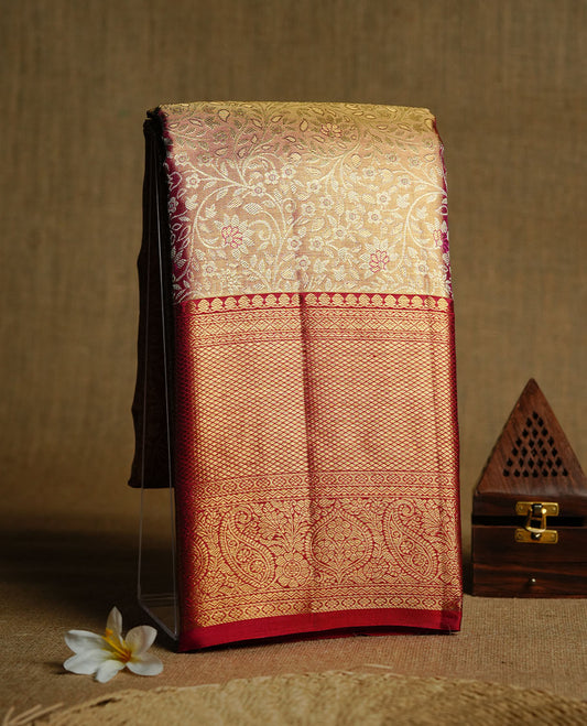 Gold & Rani pink double shade colour kancheepuram tissue silk saree featuring gold zari floral kodi pattern on body, complemented by contrast Rani pink colour with traditional border, paired with matching blouse piece.