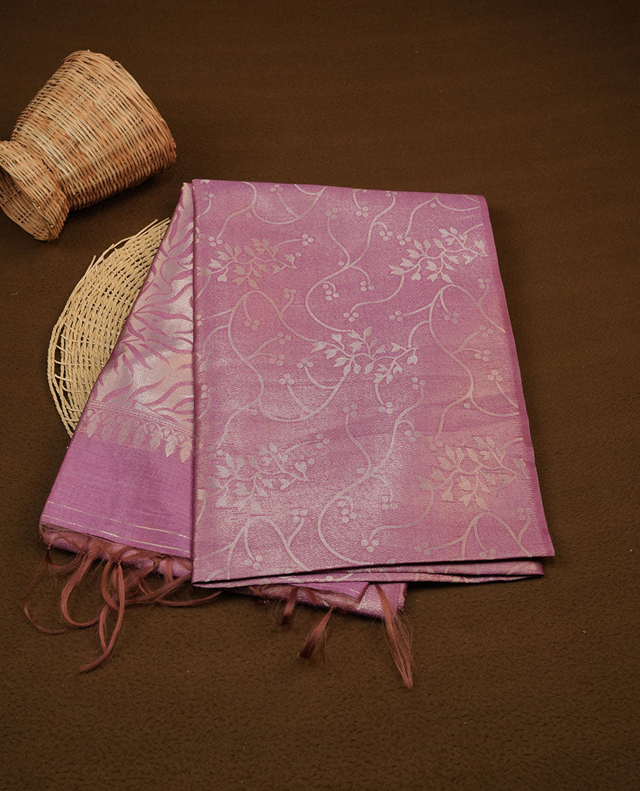 Pink colour semi tussar silk saree, featuring an intricate gold zari floral kodi pattern on the body and pallu, comes with matching blouse.
