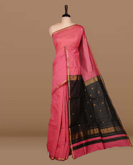 Pink colour Kalyani cotton saree features elegant gold zari motifs across the body, a classic gold zari border, a striking contrast pallu, and a matching blouse piece.