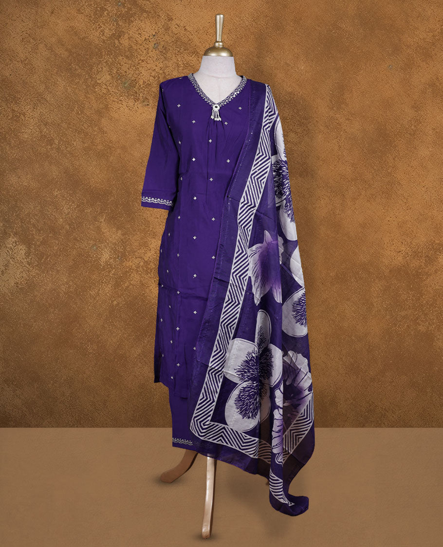 Violet colour churidar set featuring Thread & Beats, mirror embroidered neckline, sleeves, and Floral motifs body , Paired with a matching dupatta