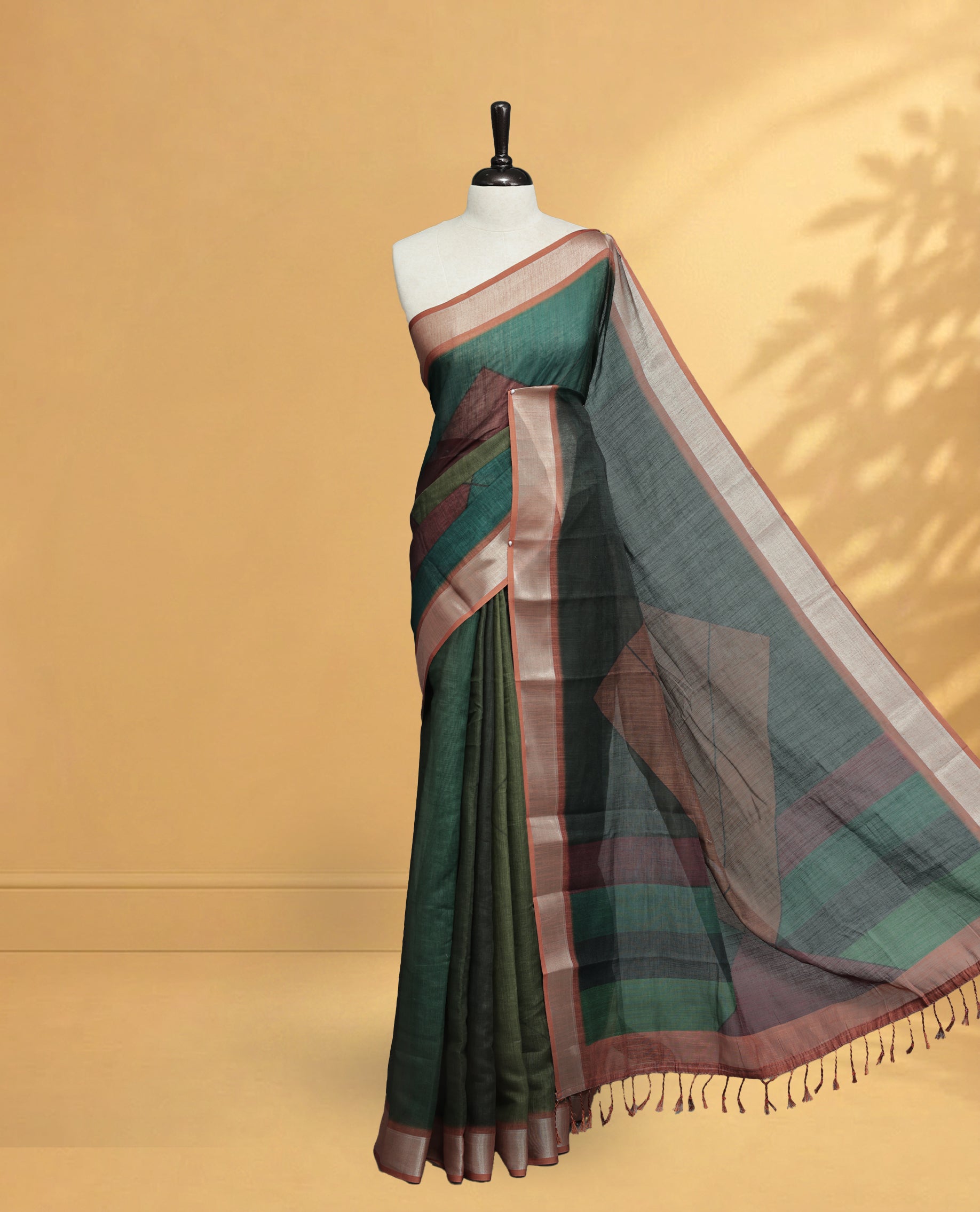 Olive Green Colour Semi Linen saree featuring digital printed body, Complemented by Borderless finish, comes with matching blouse piece.