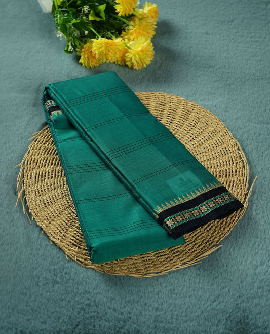 Pine green colour Narayanapattu cotton saree featuring a Dark blue colour stripped body, contrast Dark blue colour with Cream zari border and pallu, pairing a matching blouse piece.