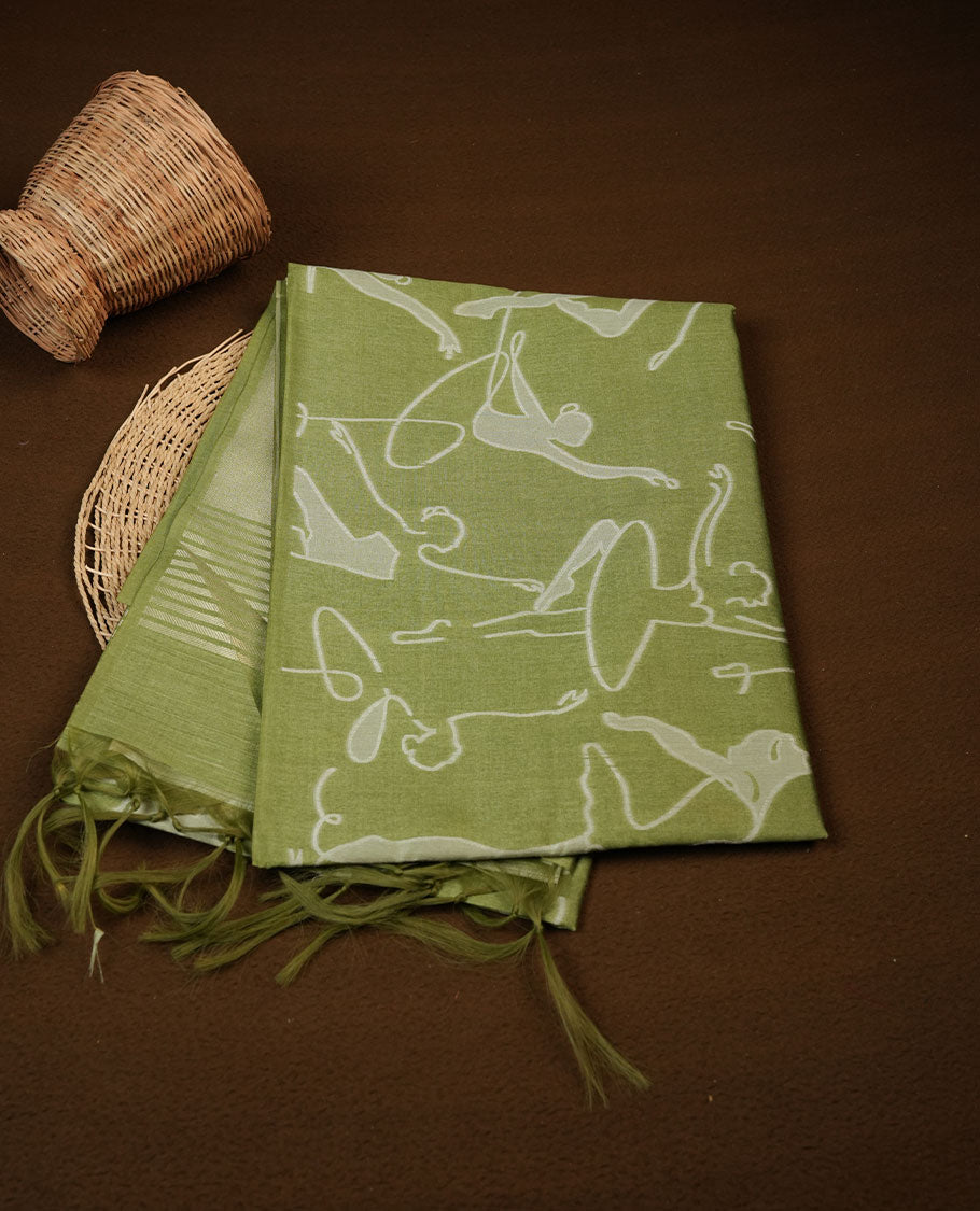 Green colour semi tussar silk saree, featuring an intricate white dancing women motif on the body and pallu with gold zari , comes with matching blouse.