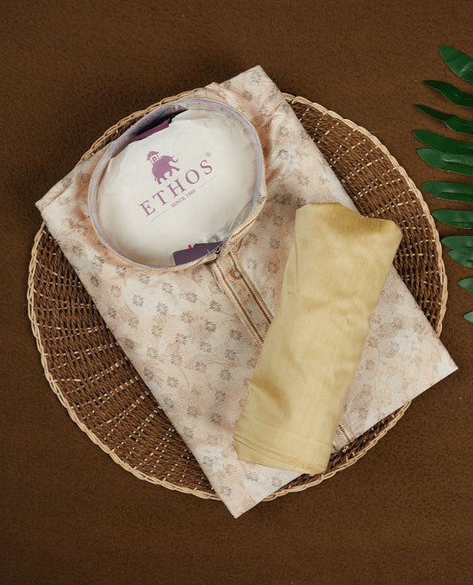 Ivory Colour Semi Silk Kurta Set featuring Self Colour Thread and Sequin Work All Over the Body, Mandarin Collar with Front Placket Detail, Full Sleeves, and Paired with a Matching Solid Bottom.