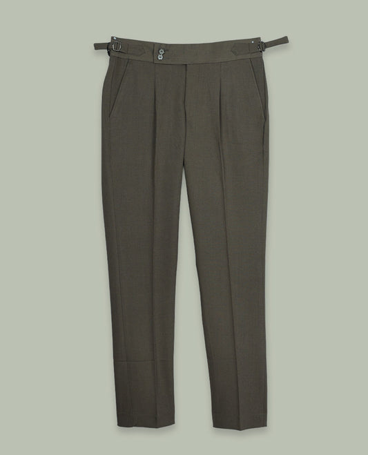 Dusty olive colour men’s pant featuring a clean waistband with side buckle adjusters, neat front pleats, slant pockets and back welt pockets, finished with a straight leg fit.