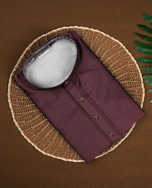 Maroon colour mens kurta featuring elegant embroidery on the neckline & Crafted in a refined style with full sleeves, offering a perfect blend of tradition.
