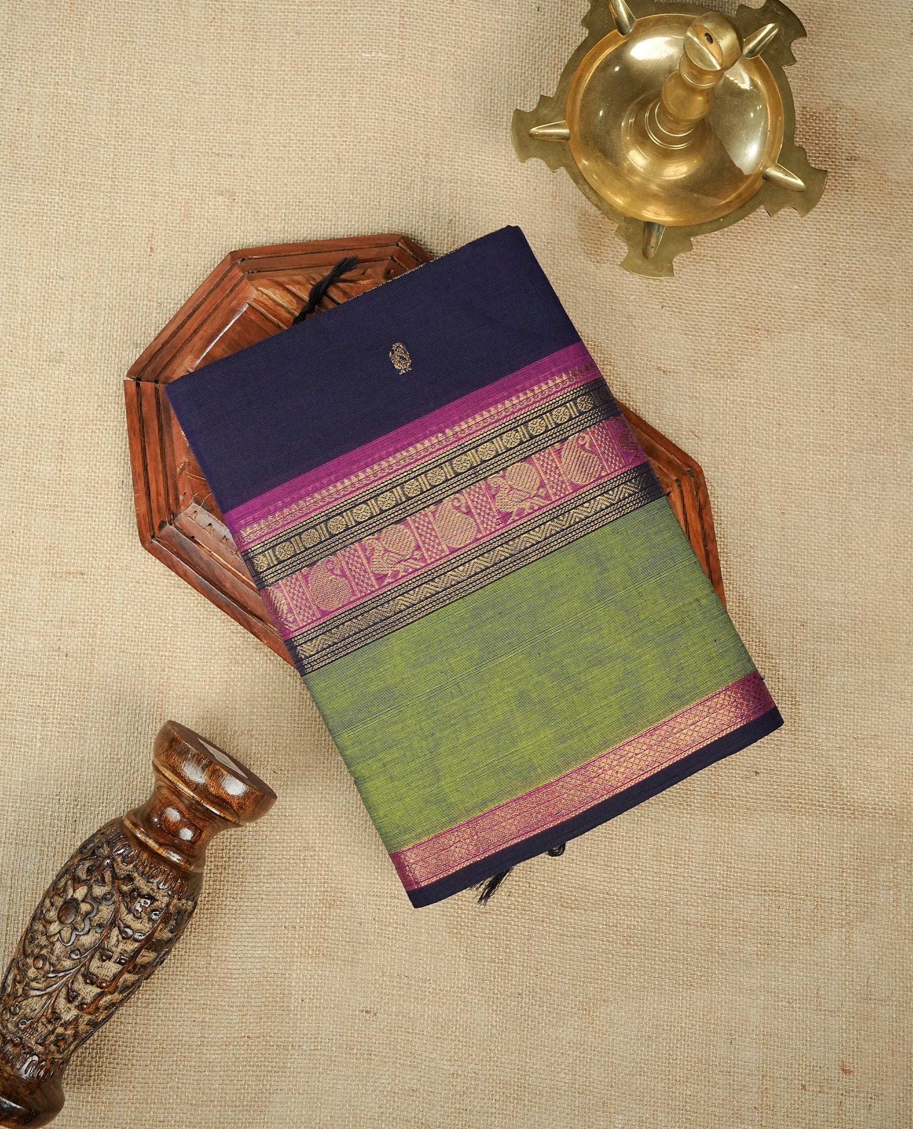 Navy Blue colour chettinad cotton saree featuring gold zari motifs on body, Contrast magenta & green colour with Gold zari border, comes with matching blouse piece.