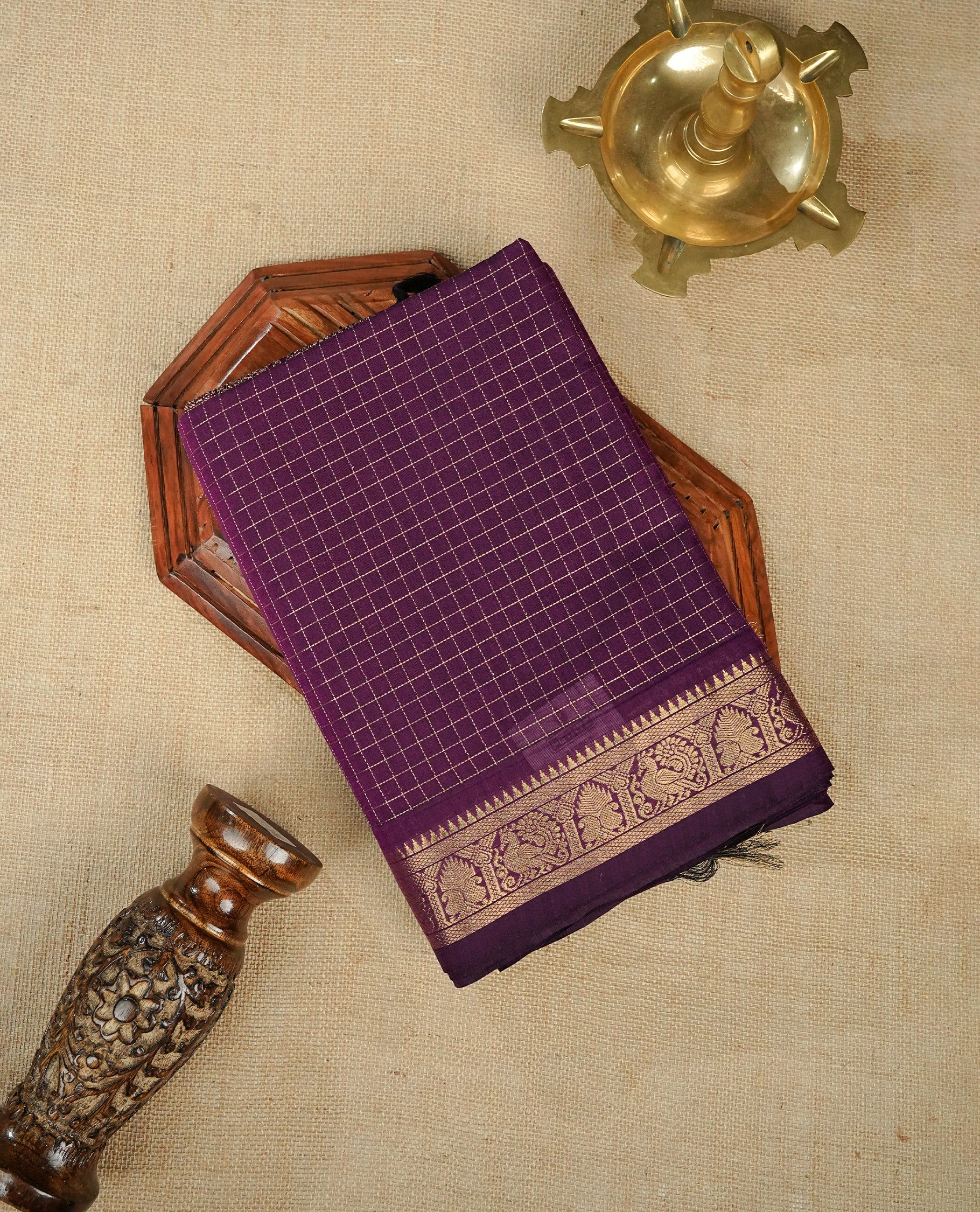 Purple colour chettinad cotton saree Featuring Gold zari Check on body, complemented by self colour with zari border, comes with matching blouse piece.