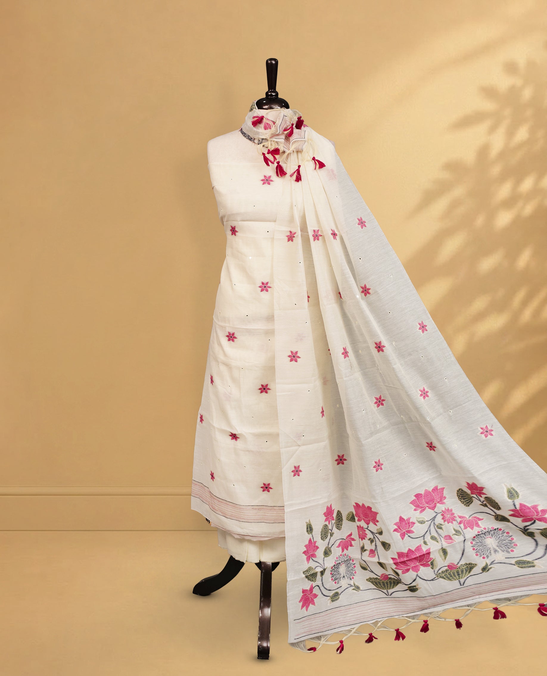 Cream colour salwar material Featuring Pink Colour Floral motifs on body, paired with matching bottom & Elegant Dupatta