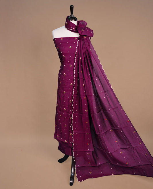 Wine colour Mulchanderi salwar suit featuring thread floral buttas on the body and matching dupatta, paired with a santon bottom.