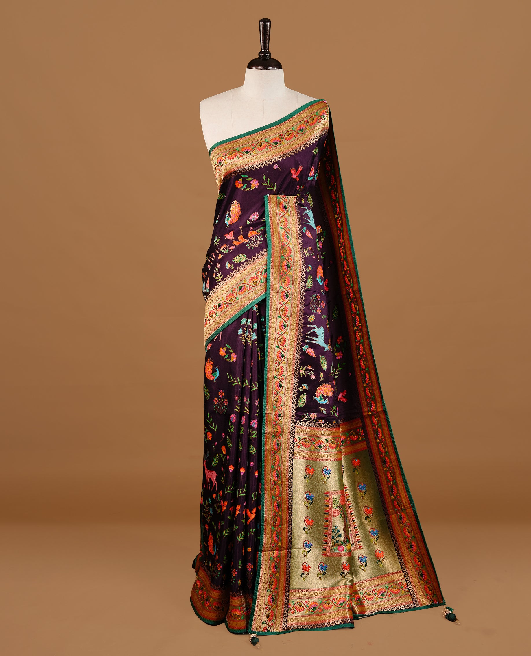 Deep Purple colour Pashmina Saree featuring a floral printed body, a multicolour floral woven border, a rich woven pallu with floral motifs, paired with a matching blouse.