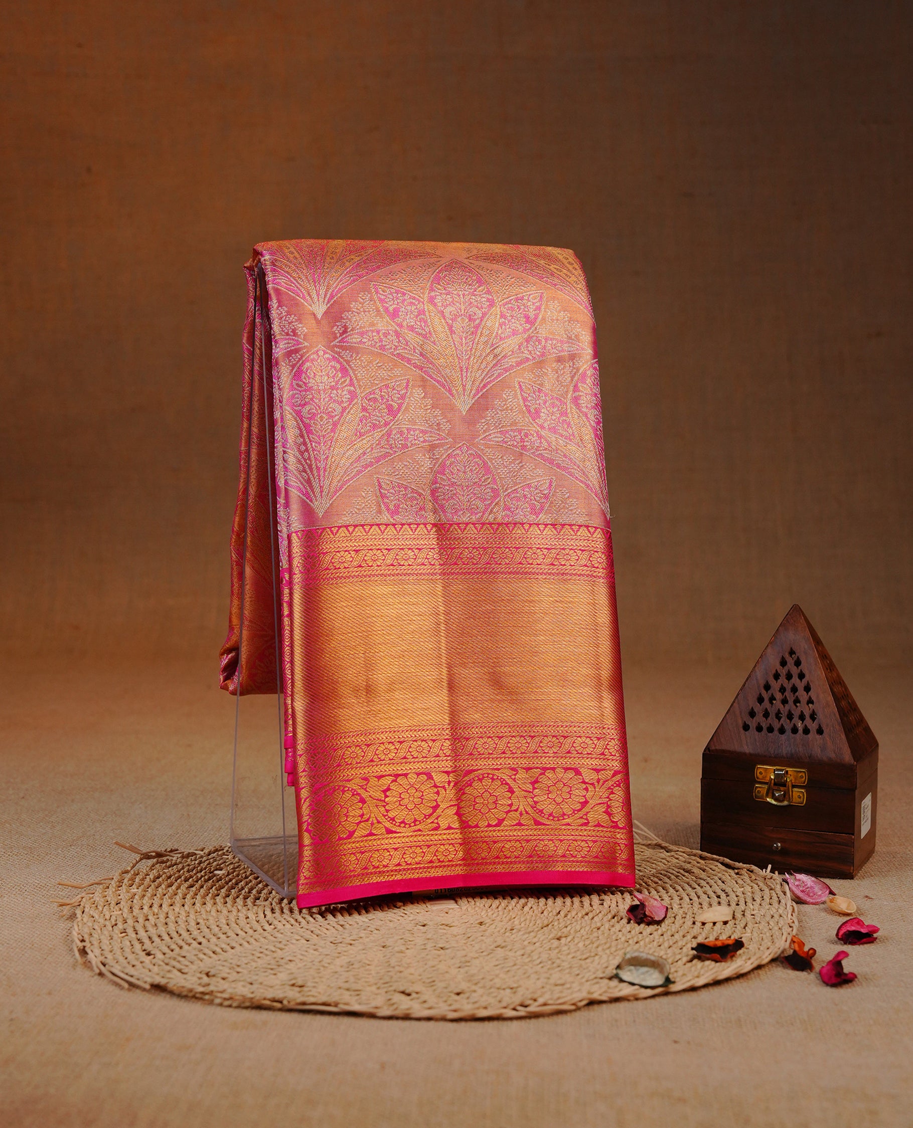 Pink & Gold double shade colour Tissue silk saree featuring Pattern on body, complemented by self colour with Gold Zari border, comes with matching blouse piece.