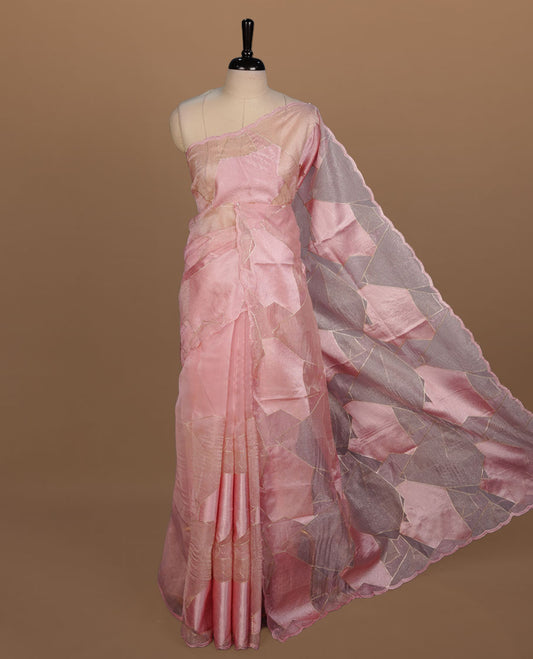 Peach colour Organza designer saree featuring a thread geometric pattern across the body, enhanced with a piping border and cut beats work on matching blouse piece.