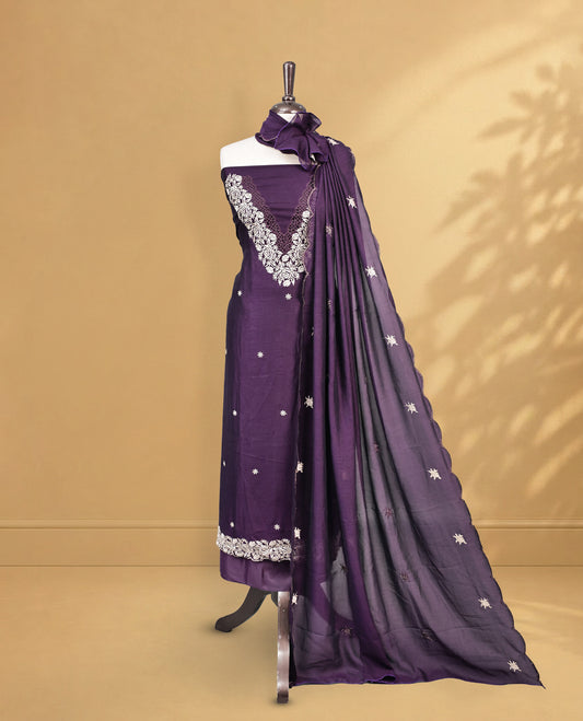 Purple colour Salwar Material Featuring Cream colour Thread pattern on Neckline & Small Buttas, paired with matching bottom & Same Colour Dupatta.