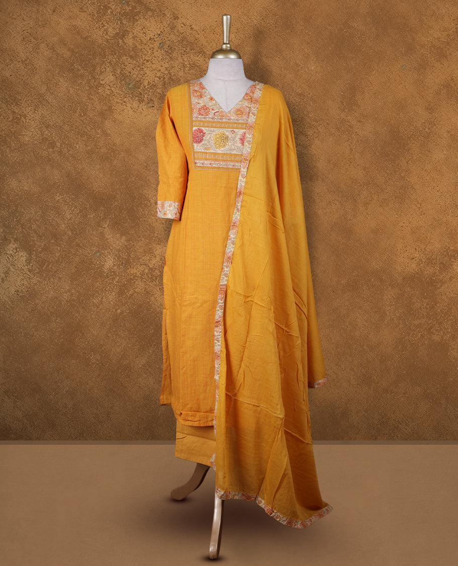 Yellow colour churidar set featuring tiny stone on V neckline, sleeves, and plain the body, Paired with a matching dupatta